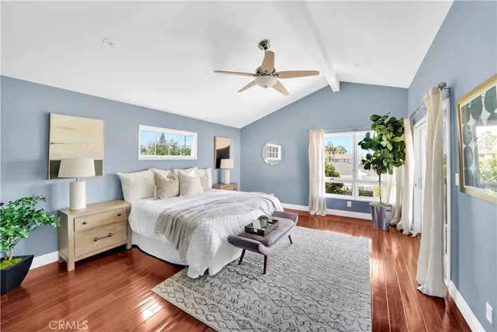 Upstairs Primary Suite - Large room with vaulted ceiling.