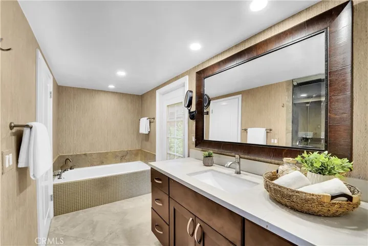 Primary Bathroom with large air tub and separate steam shower