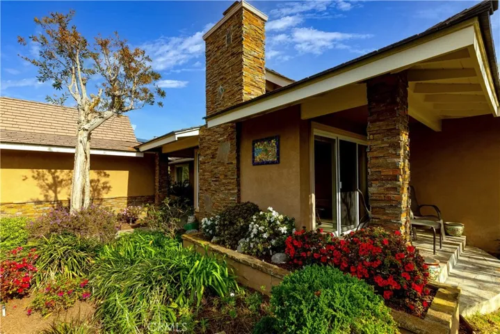 Located at the end of a cul de sac with privacy and beautiful stone casing exterior