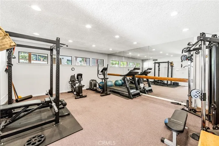 No need for a gym membership here.  You can actually just walk across the street and unlock the door to this updated gym.