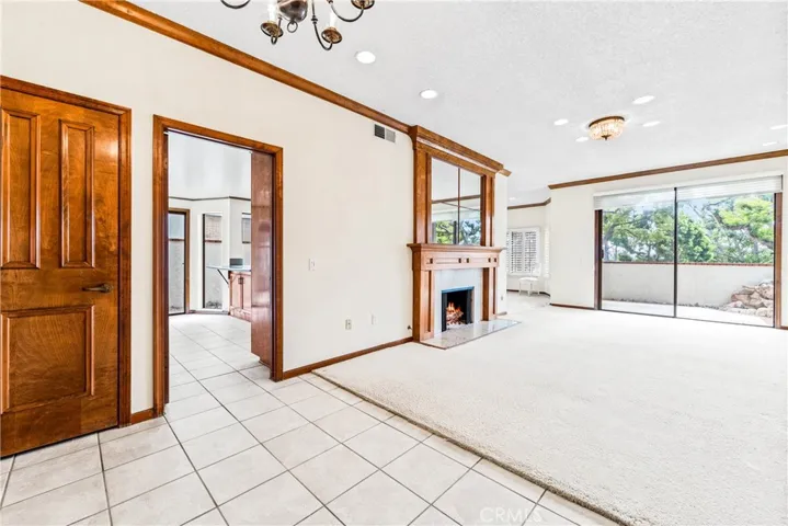 Clean tile and grout accent the openness of this living area.
