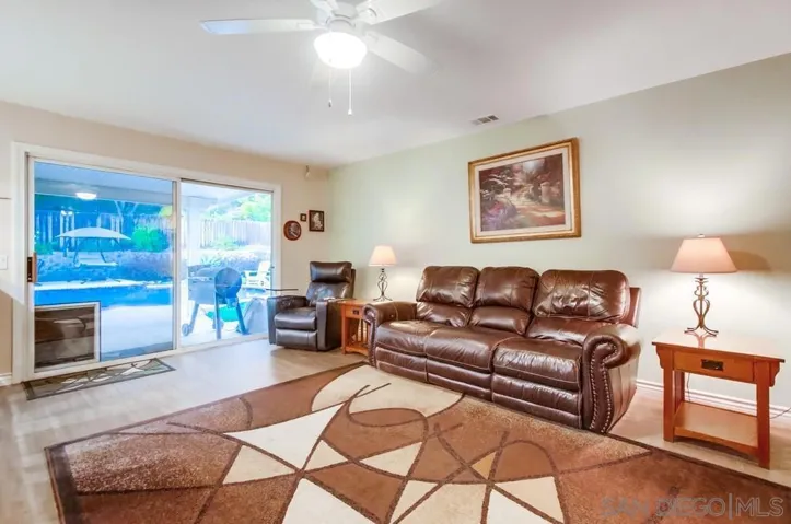 Spacious family room with slider to backyard!