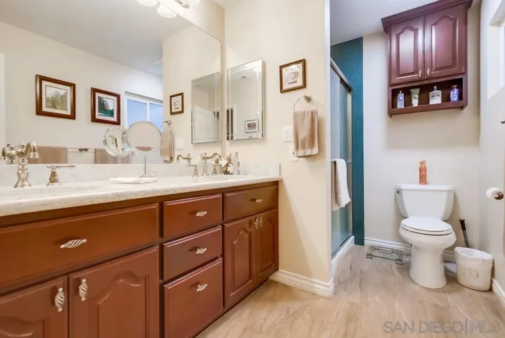 En-suite bath + custom closet system!