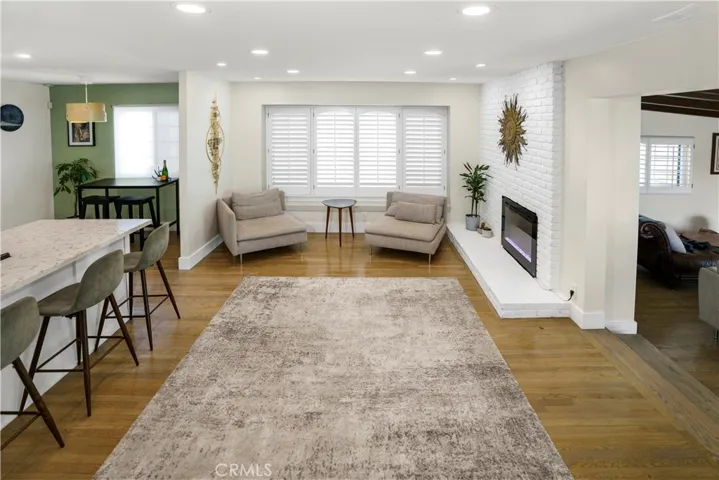 Recessed lighting, bay windows and fireplace