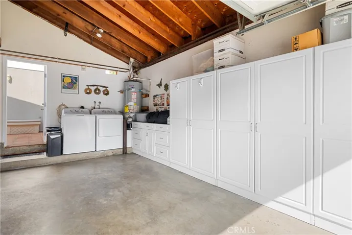 Lots of storage, cabinets are included. Rafters provide additional storage.