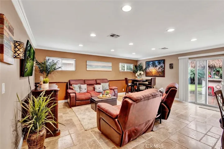 Chiseled Travertine Flooring, Dual Pane Windows, Recessed Lighting, Crown Molding