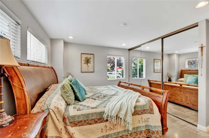 Primary Suite Features Interior Doors, Mirrored Closets with Organizers