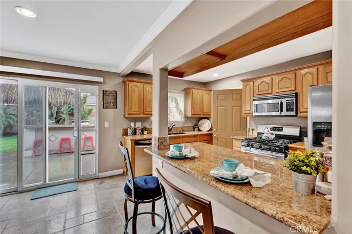 Access to the Backyard from the Open Kitchen and Living Room