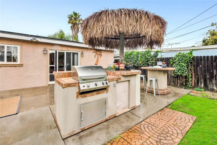 Entertaining with it's Palapa-Covered Sit-Up Bar