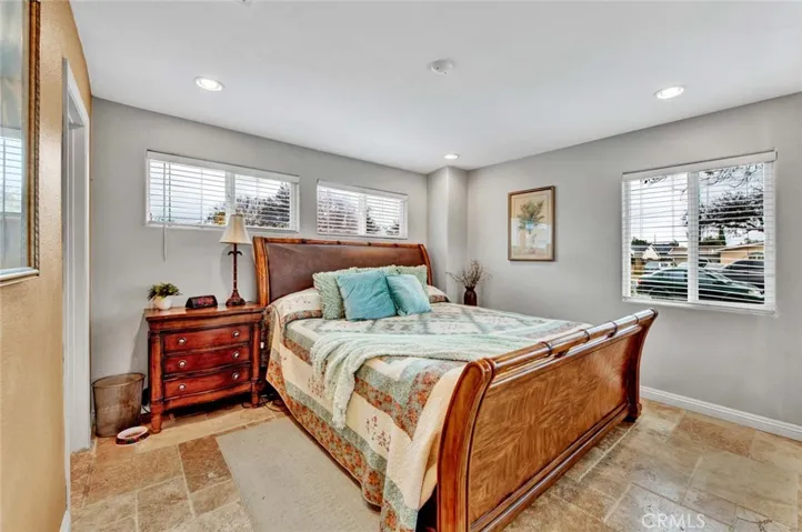 Primary Suite with multiple windows to let in natural light