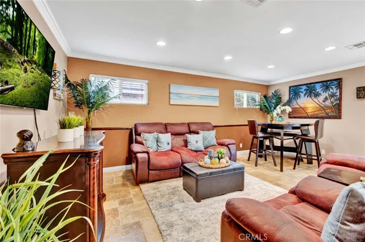 Multiple Windows in the Living Room Brings in the Natural Light