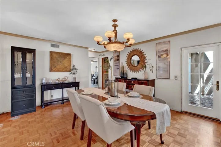 featuring a door to the open air atrium which is perfect for enjoying
summertime breezes while providing additional natural light.