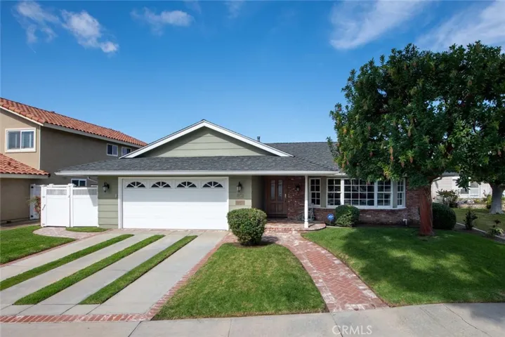 Nestled on a tree-lined street, this captivating single story residence boasts amazing
curb appeal, a large lot and sparkling pool.