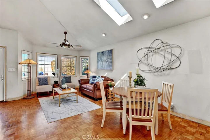 an added family room overlooks the private
backyard oasis and also boasts vaulted ceilings, two skylights, a ceiling fan and an
inviting wet bar