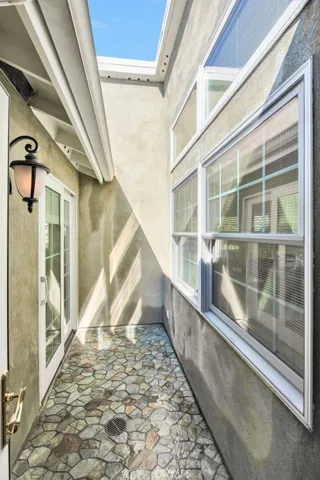open air atrium which is perfect for enjoying
summertime breezes while providing additional natural light.