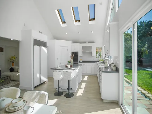 Skylights and Vaulted Ceiling accentuates the spaciousness of the kitchen