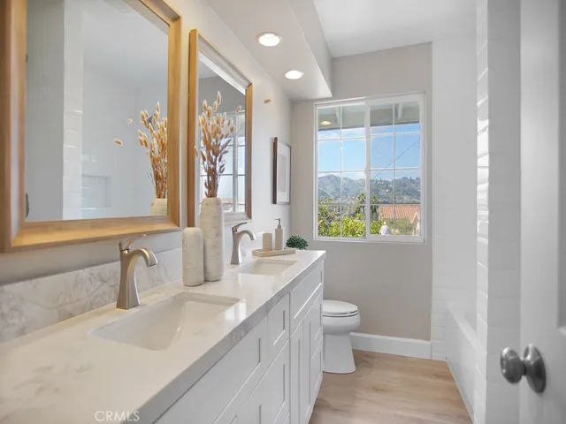 Totally Remodeled Bathroom with double sinks, separate tub and shower
