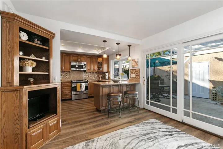 Opens to Lovely Remolded Kitchen