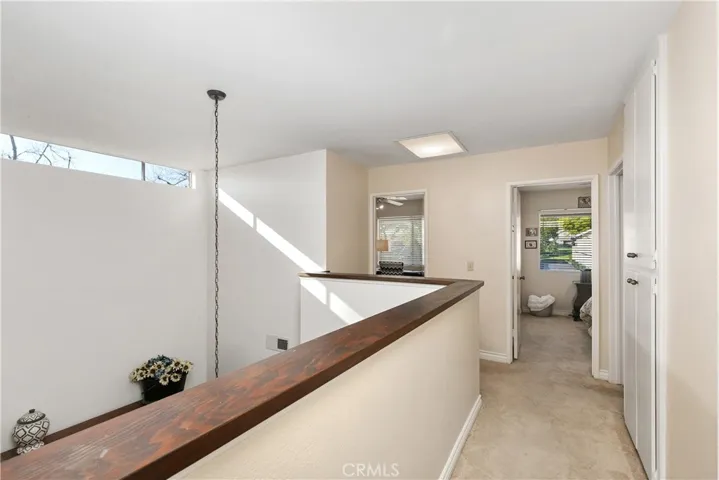 Large Hallway to other 2 Bedrooms and Bathroom