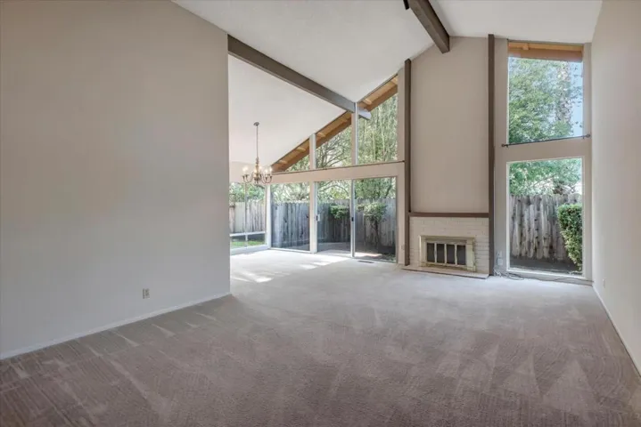 Dramatic cathedral ceilings in the living and dining rooms