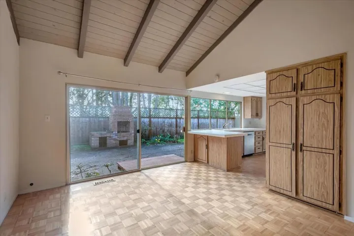 Convenient patio door gives access to the expansive backyard and BBQ area.