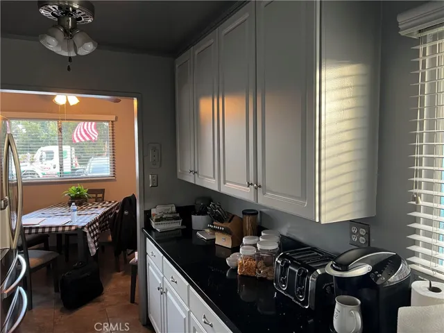 Kitchen note white cabinets  and granite countertops