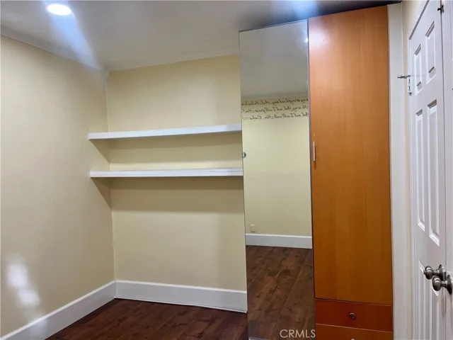 main floor bedroom with custom closet