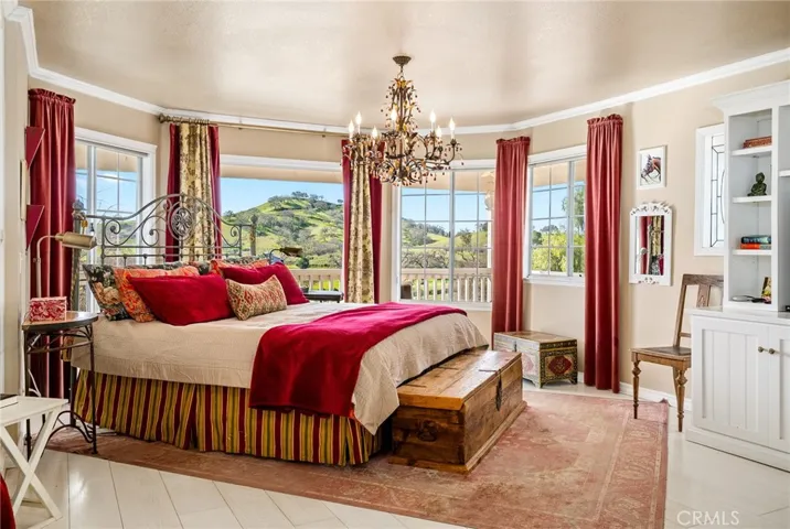 Main bedroom with access to wrap around porch
