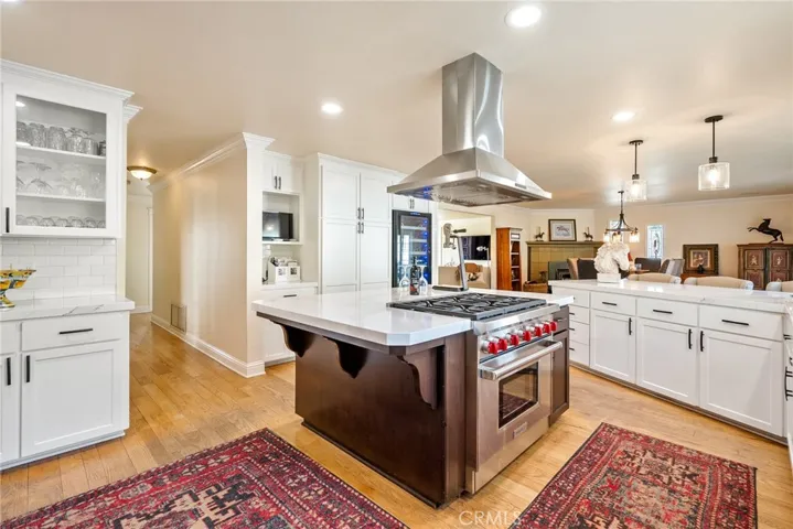Center block with inbuilt Wolf range and hood