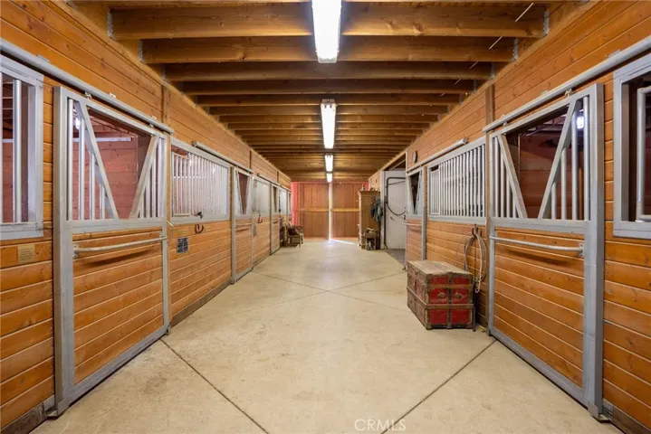 Spacious aisle with cement floor