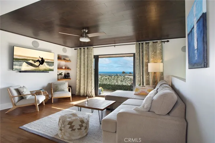 Bright and airy family room looking out towards ocean