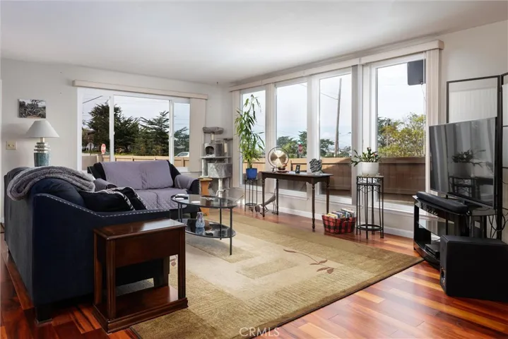 Living room with filtered views of Morro Rock & Black Hill