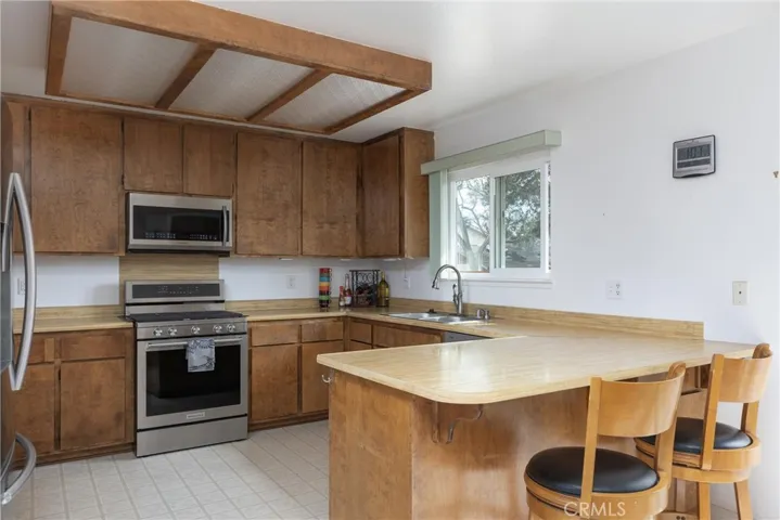 Lots of counter space and cabinets with new Kitchen Aid range & oven.