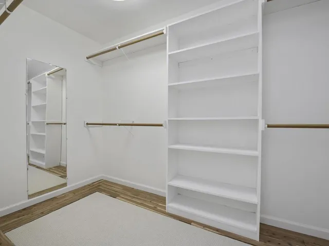 Primary Suite Retreat Walk In Closet - Back House - Main Floor