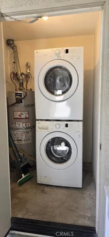 Full size Washer & Dryer in patio closet.