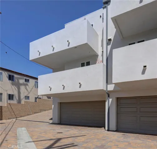 can park addtl vehicle outside garage door