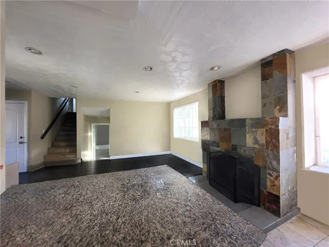 Family Room from Kitchen - PHOTO HAS BEEN PHOTOSHOPPED