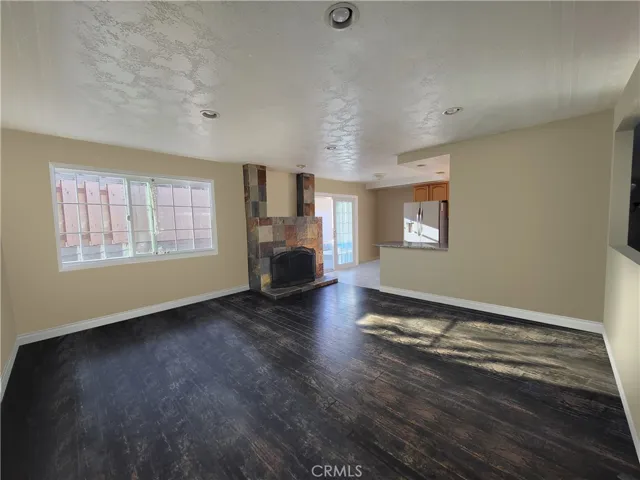 Family Room with Fireplace - PHOTO HAS BEEN PHOTOSHOPPED