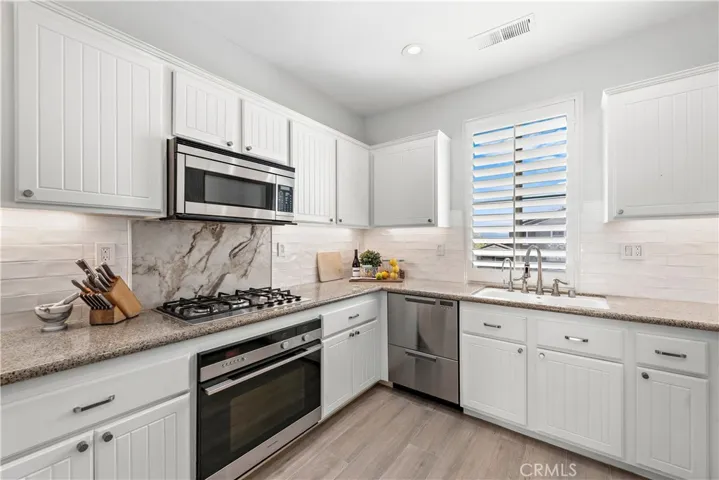 White kitchen with Fisher & Paykel appliances