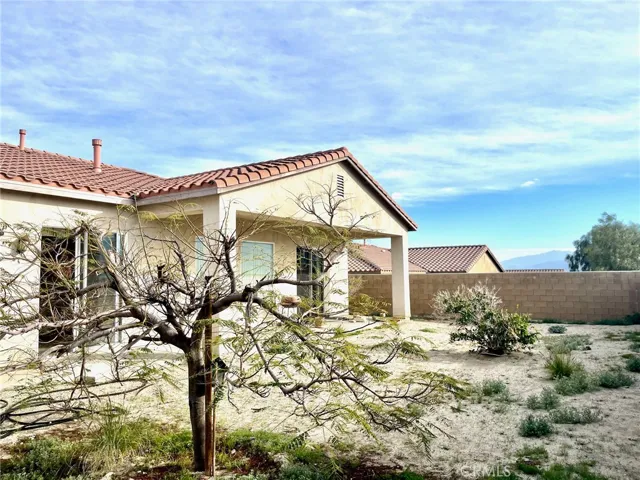Large backyard with open skies and distant views