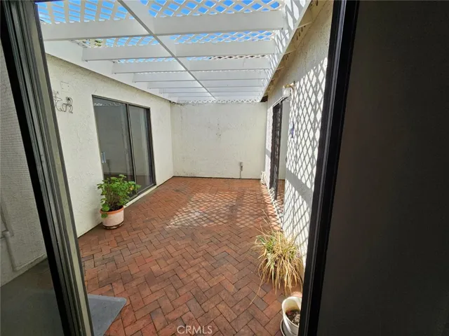 Interior atrium accessed through living room and bedrooms