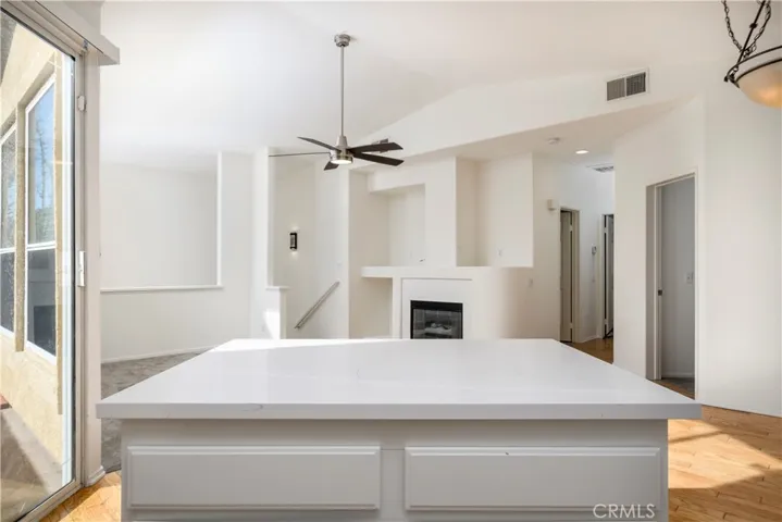 Center island complete with bar seating area and views of Living/Dining Rooms!