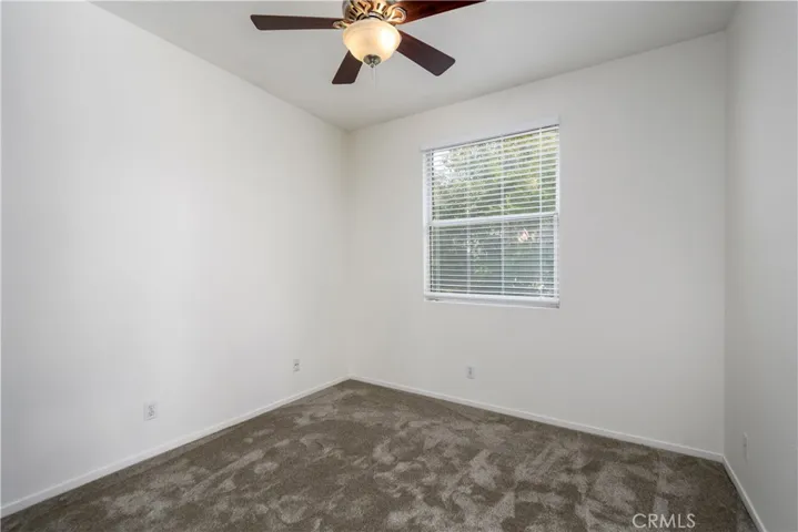 Bedroom #2 with NEW interior paint, NEW carpet, and Ceiling Fan!