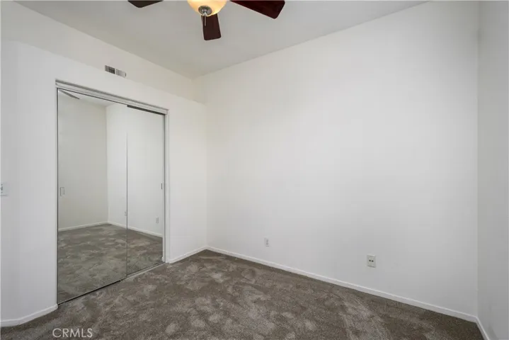 Bedroom #2 closet with mirrored closet doors!