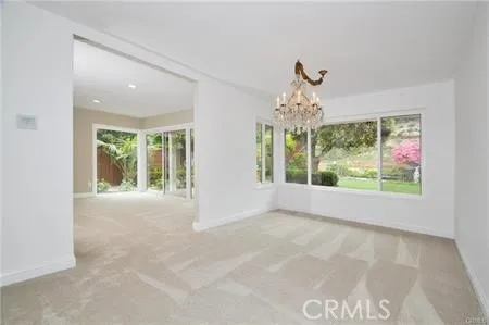 This is a old photo before the remodel of the wood floors throughout the property.