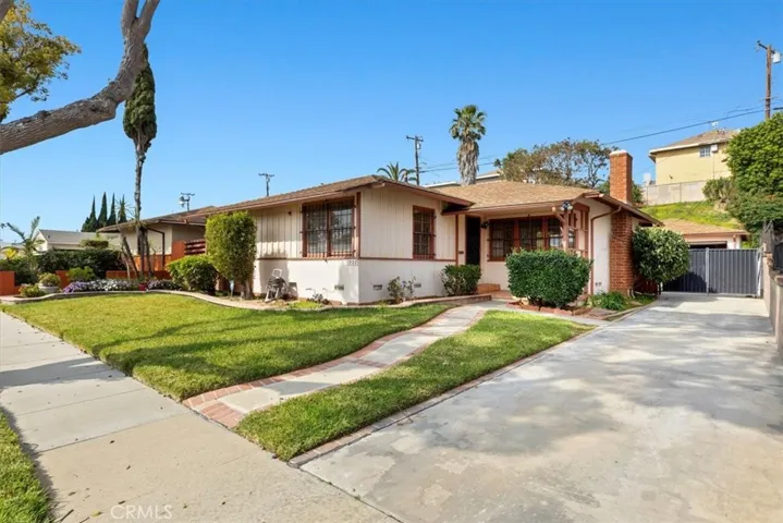 Front of house with long driveway