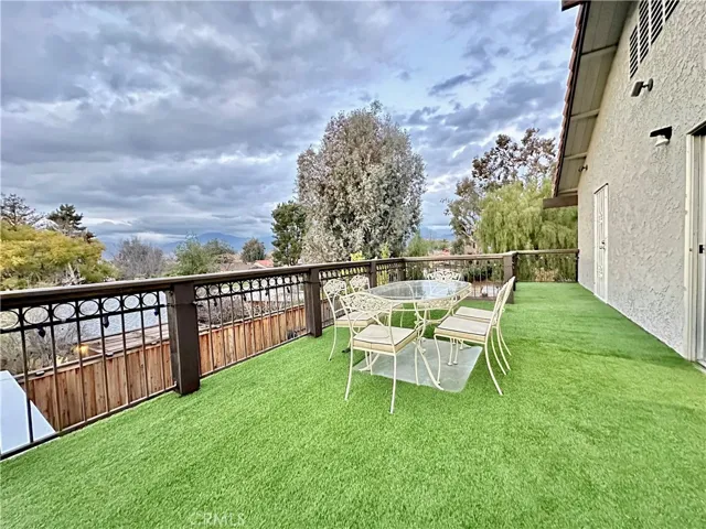 Balcony above patio