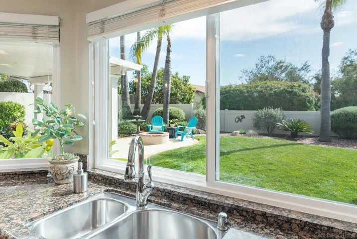 Pull out swivel faucet makes cleaning easy.