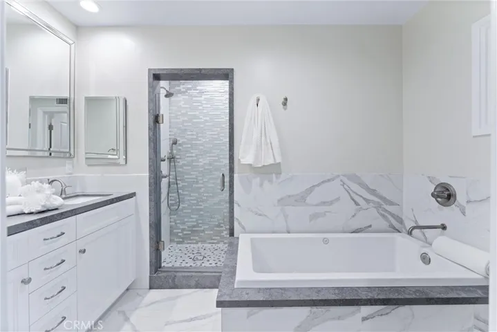 Primary separate shower and double sinks