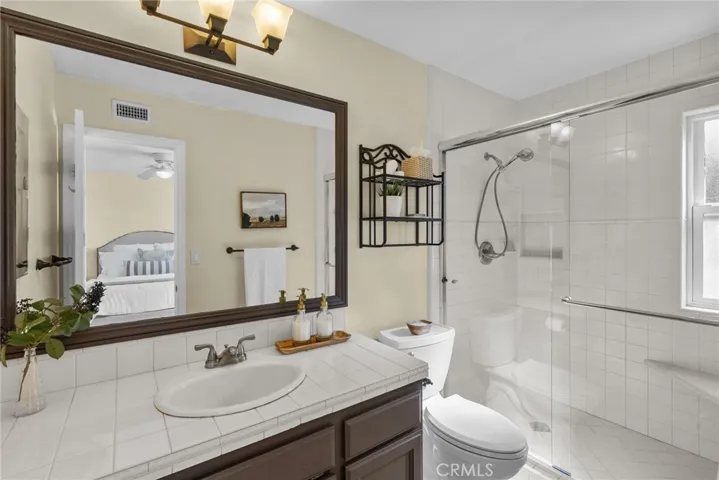 primary bathroom with walk in shower